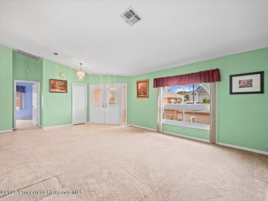 Spacious 3/2/2 well-maintained pool home with split floor plan on Seven Hills Golfers Club in Florida - for sale on GolfHomes.com, golf home, golf lot