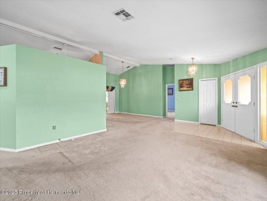 Spacious 3/2/2 well-maintained pool home with split floor plan on Seven Hills Golfers Club in Florida - for sale on GolfHomes.com, golf home, golf lot