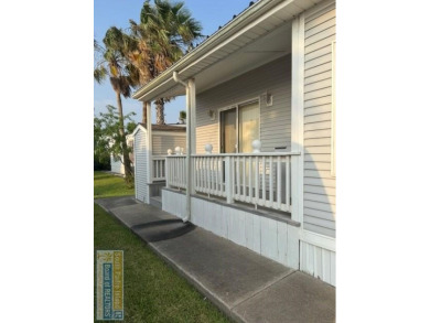 This extremely spacious park model with island room has lots of on Long Island Golf Course in Texas - for sale on GolfHomes.com, golf home, golf lot