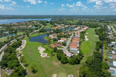 Charming Oasis in Ballantrae! Step inside this Light and Bright on Santa Lucia River Club in Florida - for sale on GolfHomes.com, golf home, golf lot