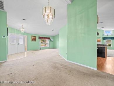 Spacious 3/2/2 well-maintained pool home with split floor plan on Seven Hills Golfers Club in Florida - for sale on GolfHomes.com, golf home, golf lot