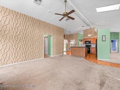 Spacious 3/2/2 well-maintained pool home with split floor plan on Seven Hills Golfers Club in Florida - for sale on GolfHomes.com, golf home, golf lot