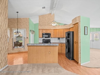 Spacious 3/2/2 well-maintained pool home with split floor plan on Seven Hills Golfers Club in Florida - for sale on GolfHomes.com, golf home, golf lot