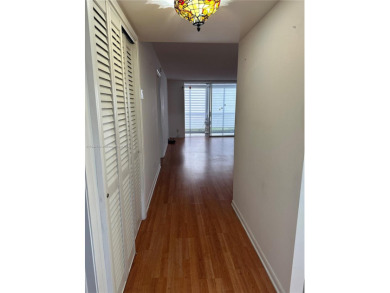 Beautiful 1 bed, 2 baths condo with screened balcony with on Sunrise Lakes Phase III in Florida - for sale on GolfHomes.com, golf home, golf lot