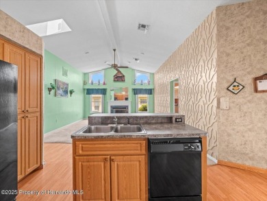 Spacious 3/2/2 well-maintained pool home with split floor plan on Seven Hills Golfers Club in Florida - for sale on GolfHomes.com, golf home, golf lot
