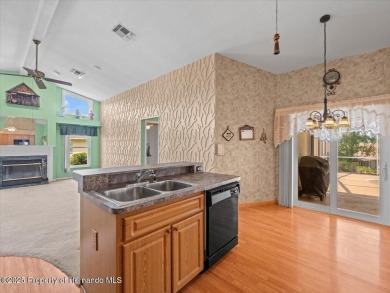 Spacious 3/2/2 well-maintained pool home with split floor plan on Seven Hills Golfers Club in Florida - for sale on GolfHomes.com, golf home, golf lot