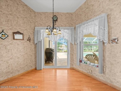 Spacious 3/2/2 well-maintained pool home with split floor plan on Seven Hills Golfers Club in Florida - for sale on GolfHomes.com, golf home, golf lot