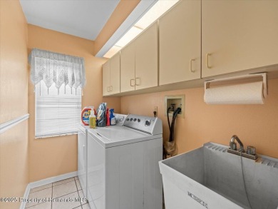 Spacious 3/2/2 well-maintained pool home with split floor plan on Seven Hills Golfers Club in Florida - for sale on GolfHomes.com, golf home, golf lot