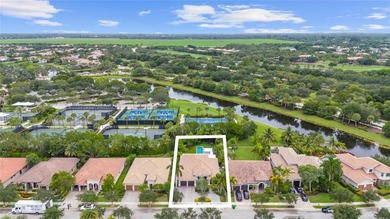 Gorgeous single story 3 bedroom 2 bath home w/custom pool/spa on Parkland Golf Club in Florida - for sale on GolfHomes.com, golf home, golf lot