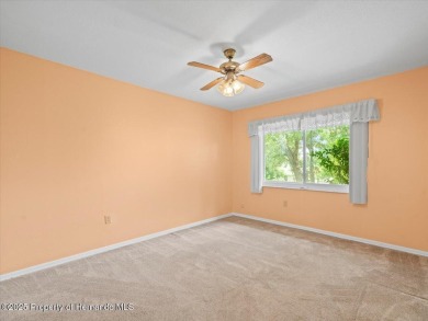 Spacious 3/2/2 well-maintained pool home with split floor plan on Seven Hills Golfers Club in Florida - for sale on GolfHomes.com, golf home, golf lot