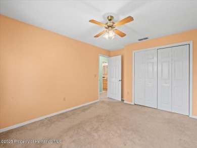 Spacious 3/2/2 well-maintained pool home with split floor plan on Seven Hills Golfers Club in Florida - for sale on GolfHomes.com, golf home, golf lot