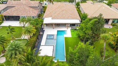 Gorgeous single story 3 bedroom 2 bath home w/custom pool/spa on Parkland Golf Club in Florida - for sale on GolfHomes.com, golf home, golf lot