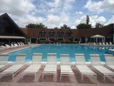 Amazing waterfront unit overlooking the canal and golf course! on Inverrary Country Club in Florida - for sale on GolfHomes.com, golf home, golf lot