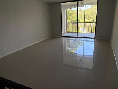 Amazing waterfront unit overlooking the canal and golf course! on Inverrary Country Club in Florida - for sale on GolfHomes.com, golf home, golf lot