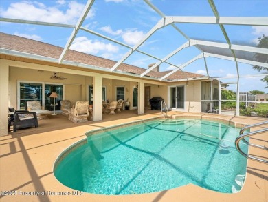 Spacious 3/2/2 well-maintained pool home with split floor plan on Seven Hills Golfers Club in Florida - for sale on GolfHomes.com, golf home, golf lot