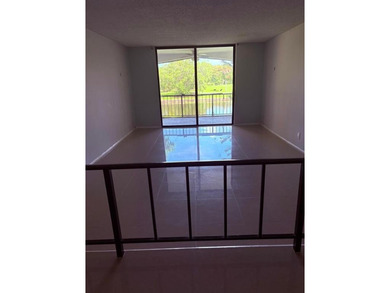 Amazing waterfront unit overlooking the canal and golf course! on Inverrary Country Club in Florida - for sale on GolfHomes.com, golf home, golf lot