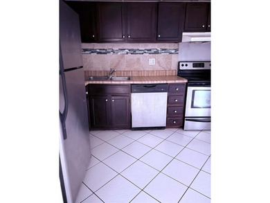 Amazing waterfront unit overlooking the canal and golf course! on Inverrary Country Club in Florida - for sale on GolfHomes.com, golf home, golf lot