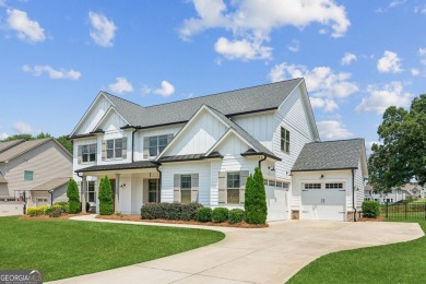 Imagine waking up to stunning views of the green, enjoying your on Traditions of Braselton Golf Club in Georgia - for sale on GolfHomes.com, golf home, golf lot