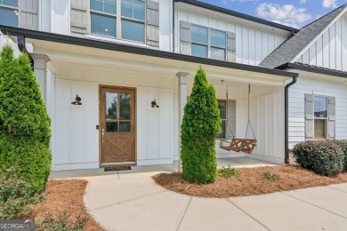 Imagine waking up to stunning views of the green, enjoying your on Traditions of Braselton Golf Club in Georgia - for sale on GolfHomes.com, golf home, golf lot