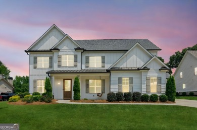 Imagine waking up to stunning views of the green, enjoying your on Traditions of Braselton Golf Club in Georgia - for sale on GolfHomes.com, golf home, golf lot