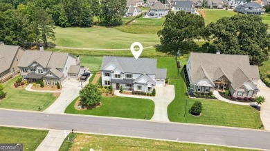 Imagine waking up to stunning views of the green, enjoying your on Traditions of Braselton Golf Club in Georgia - for sale on GolfHomes.com, golf home, golf lot
