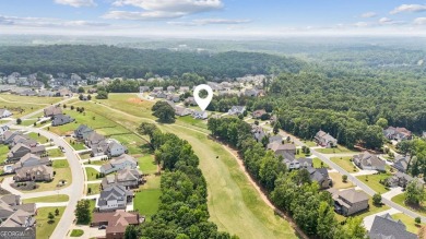 Imagine waking up to stunning views of the green, enjoying your on Traditions of Braselton Golf Club in Georgia - for sale on GolfHomes.com, golf home, golf lot