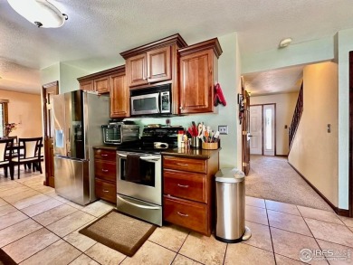Step into resort-style living with this stunning 5 bedroom, 4 on Highland Hills Golf Course in Colorado - for sale on GolfHomes.com, golf home, golf lot