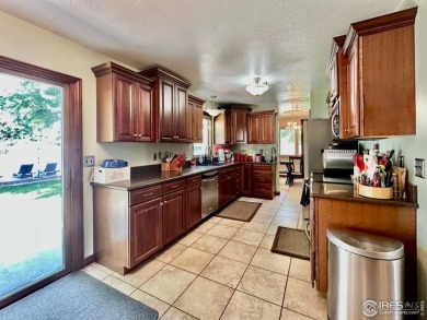 Step into resort-style living with this stunning 5 bedroom, 4 on Highland Hills Golf Course in Colorado - for sale on GolfHomes.com, golf home, golf lot