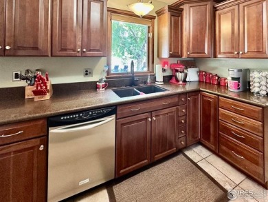 Step into resort-style living with this stunning 5 bedroom, 4 on Highland Hills Golf Course in Colorado - for sale on GolfHomes.com, golf home, golf lot