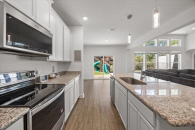 Discover a home that combines modern luxury, ample space, and an on Windswept Dunes Golf Club in Florida - for sale on GolfHomes.com, golf home, golf lot