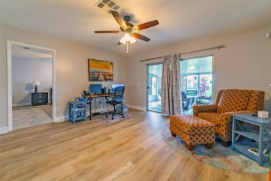 Welcome to this charming and move-in ready home in Sun City on Caloosa Greens Executive Golf Course in Florida - for sale on GolfHomes.com, golf home, golf lot