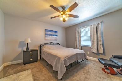 Welcome to this charming and move-in ready home in Sun City on Caloosa Greens Executive Golf Course in Florida - for sale on GolfHomes.com, golf home, golf lot