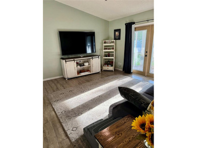 Check out this beautifully maintained home nestled in the on The Grand Club - Pine Lakes Course in Florida - for sale on GolfHomes.com, golf home, golf lot