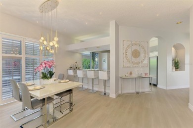 Welcome to your future oasis--this beautiful pool home nestled on Rosedale Golf and Tennis Club in Florida - for sale on GolfHomes.com, golf home, golf lot