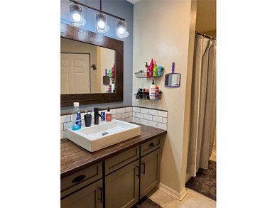 Check out this beautifully maintained home nestled in the on The Grand Club - Pine Lakes Course in Florida - for sale on GolfHomes.com, golf home, golf lot