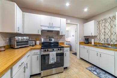 Welcome to this charming and move-in ready home in Sun City on Caloosa Greens Executive Golf Course in Florida - for sale on GolfHomes.com, golf home, golf lot