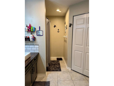 Check out this beautifully maintained home nestled in the on The Grand Club - Pine Lakes Course in Florida - for sale on GolfHomes.com, golf home, golf lot