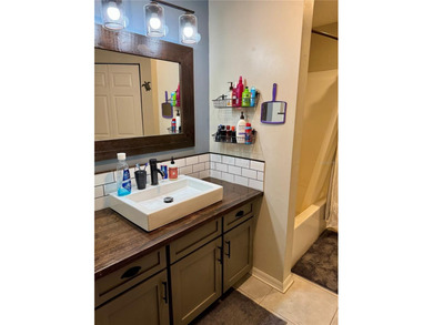 Check out this beautifully maintained home nestled in the on The Grand Club - Pine Lakes Course in Florida - for sale on GolfHomes.com, golf home, golf lot