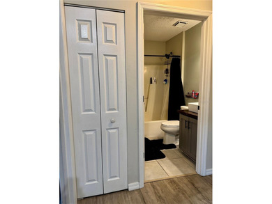 Check out this beautifully maintained home nestled in the on The Grand Club - Pine Lakes Course in Florida - for sale on GolfHomes.com, golf home, golf lot