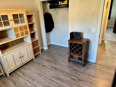 Check out this beautifully maintained home nestled in the on The Grand Club - Pine Lakes Course in Florida - for sale on GolfHomes.com, golf home, golf lot