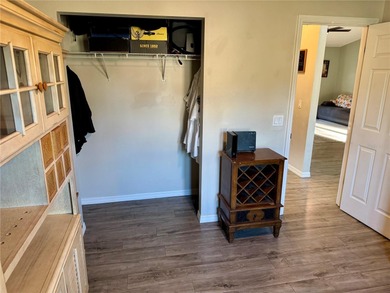 Check out this beautifully maintained home nestled in the on The Grand Club - Pine Lakes Course in Florida - for sale on GolfHomes.com, golf home, golf lot