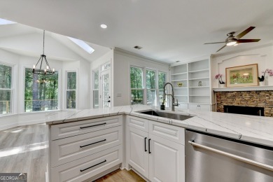 Discover a meticulously designed home that seamlessly blends on Canongate At Olde Atlanta Golf Club in Georgia - for sale on GolfHomes.com, golf home, golf lot