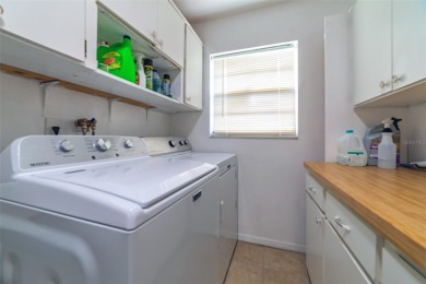 Welcome to this charming and move-in ready home in Sun City on Caloosa Greens Executive Golf Course in Florida - for sale on GolfHomes.com, golf home, golf lot