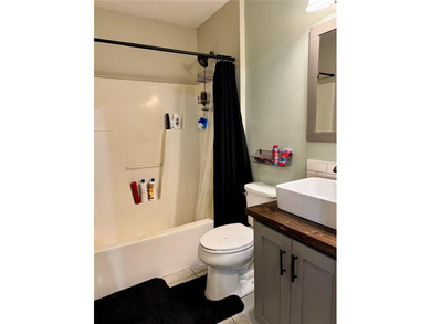 Check out this beautifully maintained home nestled in the on The Grand Club - Pine Lakes Course in Florida - for sale on GolfHomes.com, golf home, golf lot