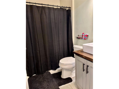 Check out this beautifully maintained home nestled in the on The Grand Club - Pine Lakes Course in Florida - for sale on GolfHomes.com, golf home, golf lot