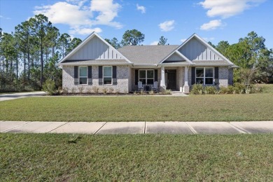 Discover a home that combines modern luxury, ample space, and an on Windswept Dunes Golf Club in Florida - for sale on GolfHomes.com, golf home, golf lot