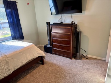 Check out this beautifully maintained home nestled in the on The Grand Club - Pine Lakes Course in Florida - for sale on GolfHomes.com, golf home, golf lot