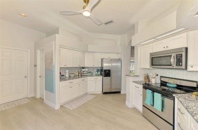 Welcome to your future oasis--this beautiful pool home nestled on Rosedale Golf and Tennis Club in Florida - for sale on GolfHomes.com, golf home, golf lot