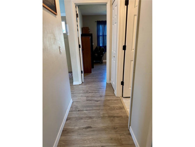 Check out this beautifully maintained home nestled in the on The Grand Club - Pine Lakes Course in Florida - for sale on GolfHomes.com, golf home, golf lot