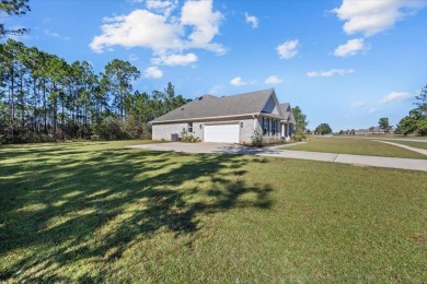 Discover a home that combines modern luxury, ample space, and an on Windswept Dunes Golf Club in Florida - for sale on GolfHomes.com, golf home, golf lot